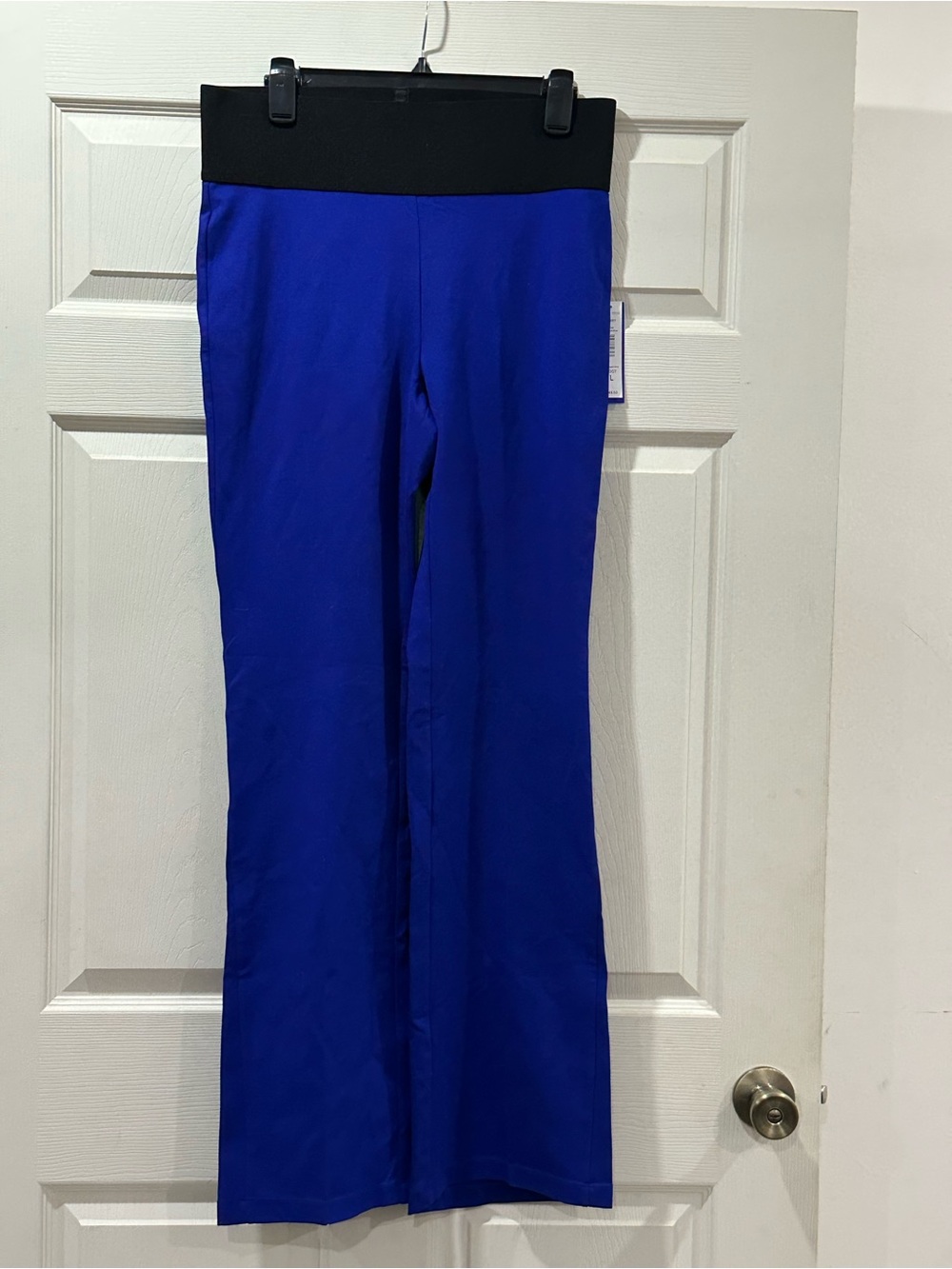 Peter Nygård Bold Royal Blue Label with Silver Logo